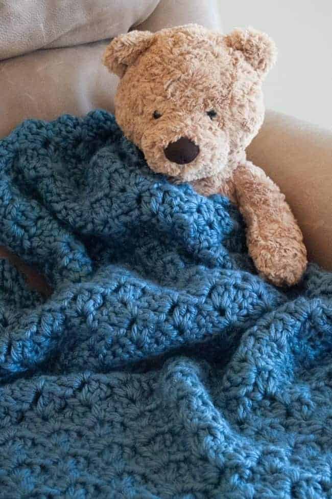 teddy bear and blue crochet baby afghan
