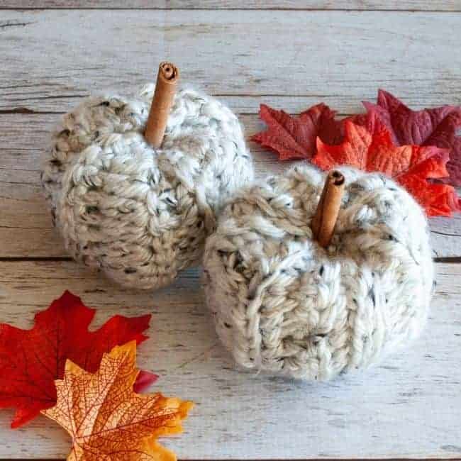two crochet pumpkins