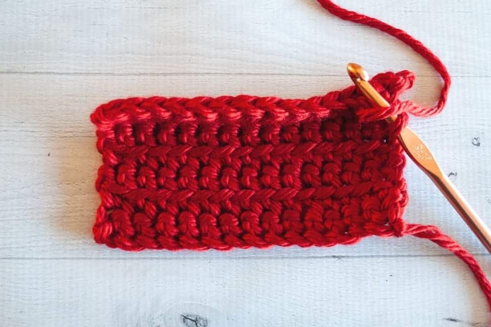 swatch of single crochet front loop only fabric with top edge turned up