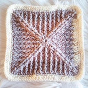 crochet textured granny square on a white background
