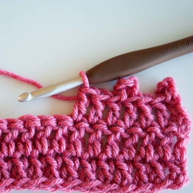 row of double crochet stitches with picots on top