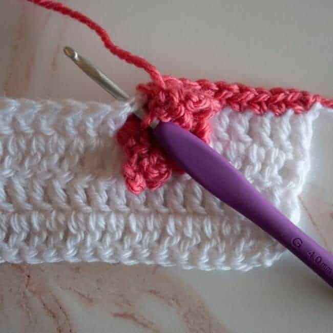 insert hook to make the single crochet stitch