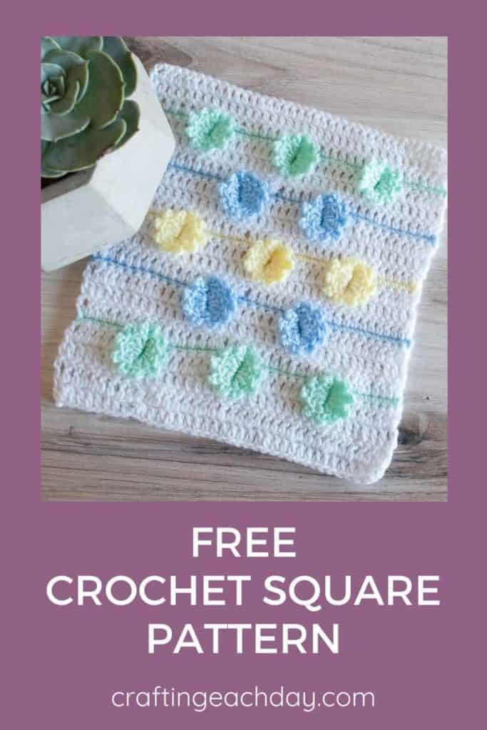 crochet square with flowers and text reading free crochet square pattern