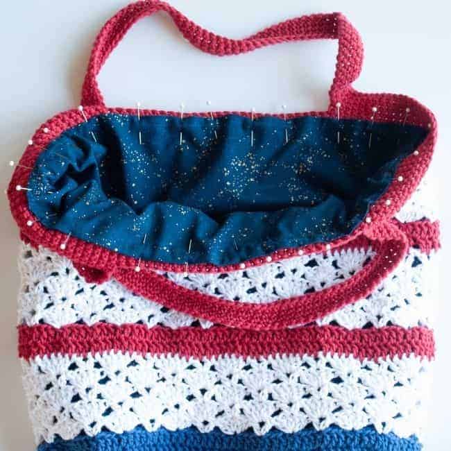 pinning the lining inside the crochet bag