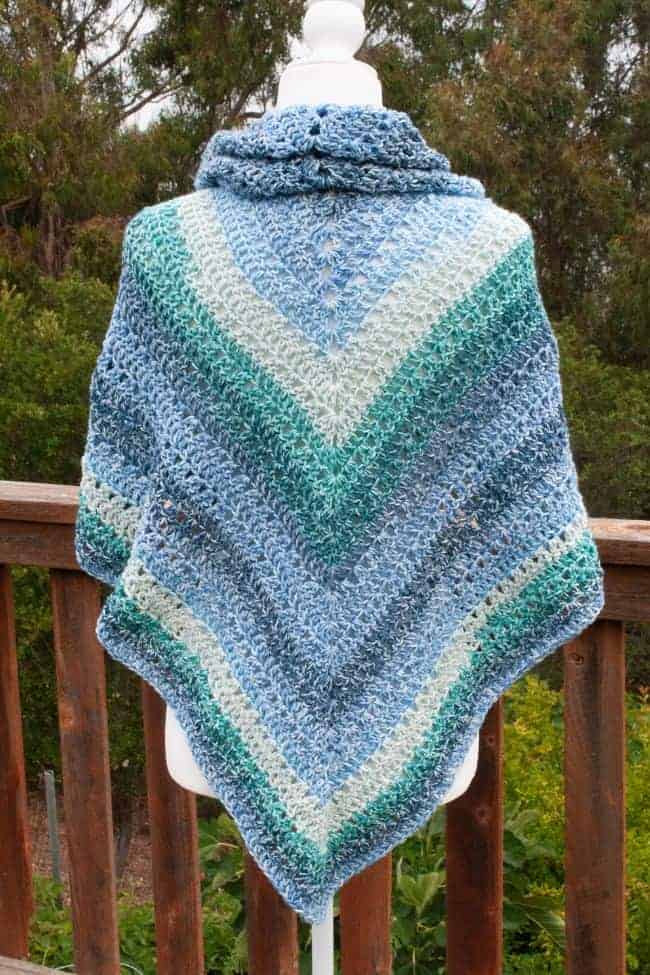 back of triangle crochet shawl on a mannequin
