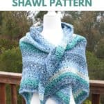 triangle crochet shawl wrapped loosely on a mannquin and text reading free beginner triangle crochet shawl pattern
