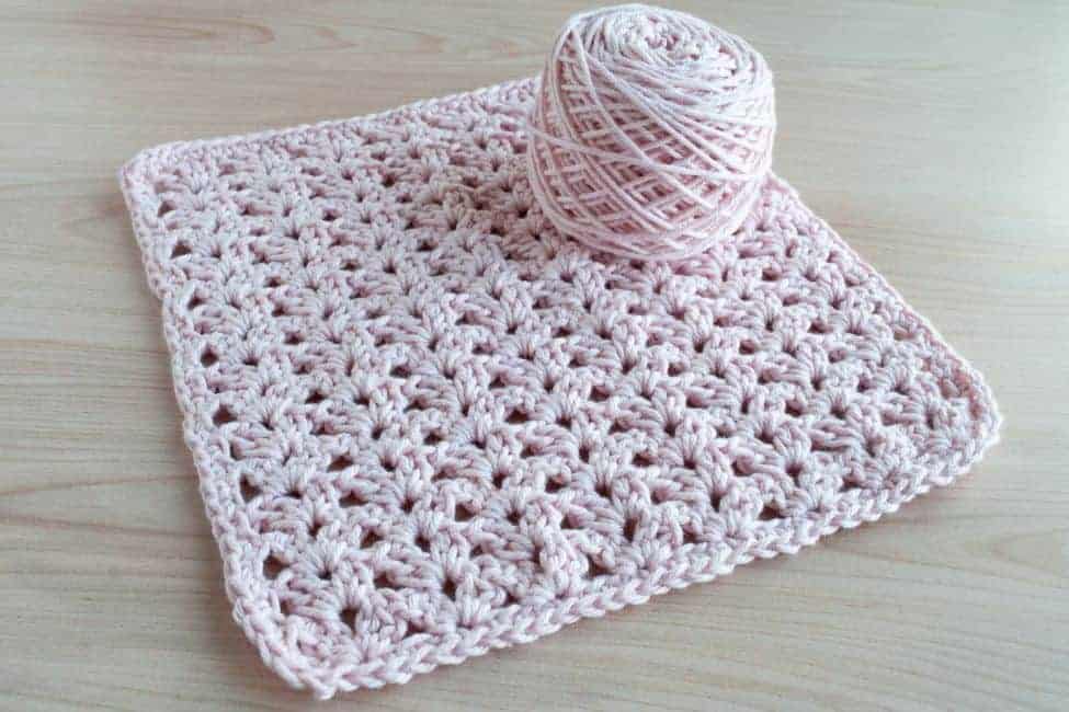 washcloth with ball of yarn on top