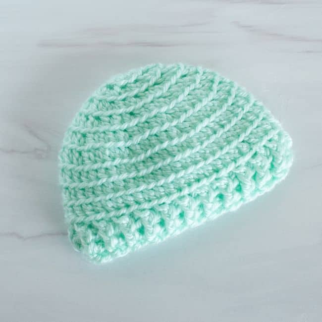 green crochet baby hat