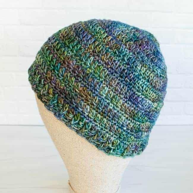 side view of crocheted beanie on a mannequin head